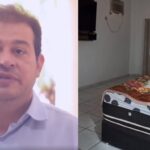 Um homem de camisa clara fala em frente a uma câmera ao lado de um quarto com cama e armário
