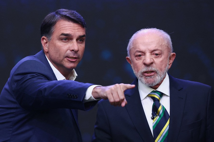 Lula e Flávio Bolsonaro cumprem atos em três capitais